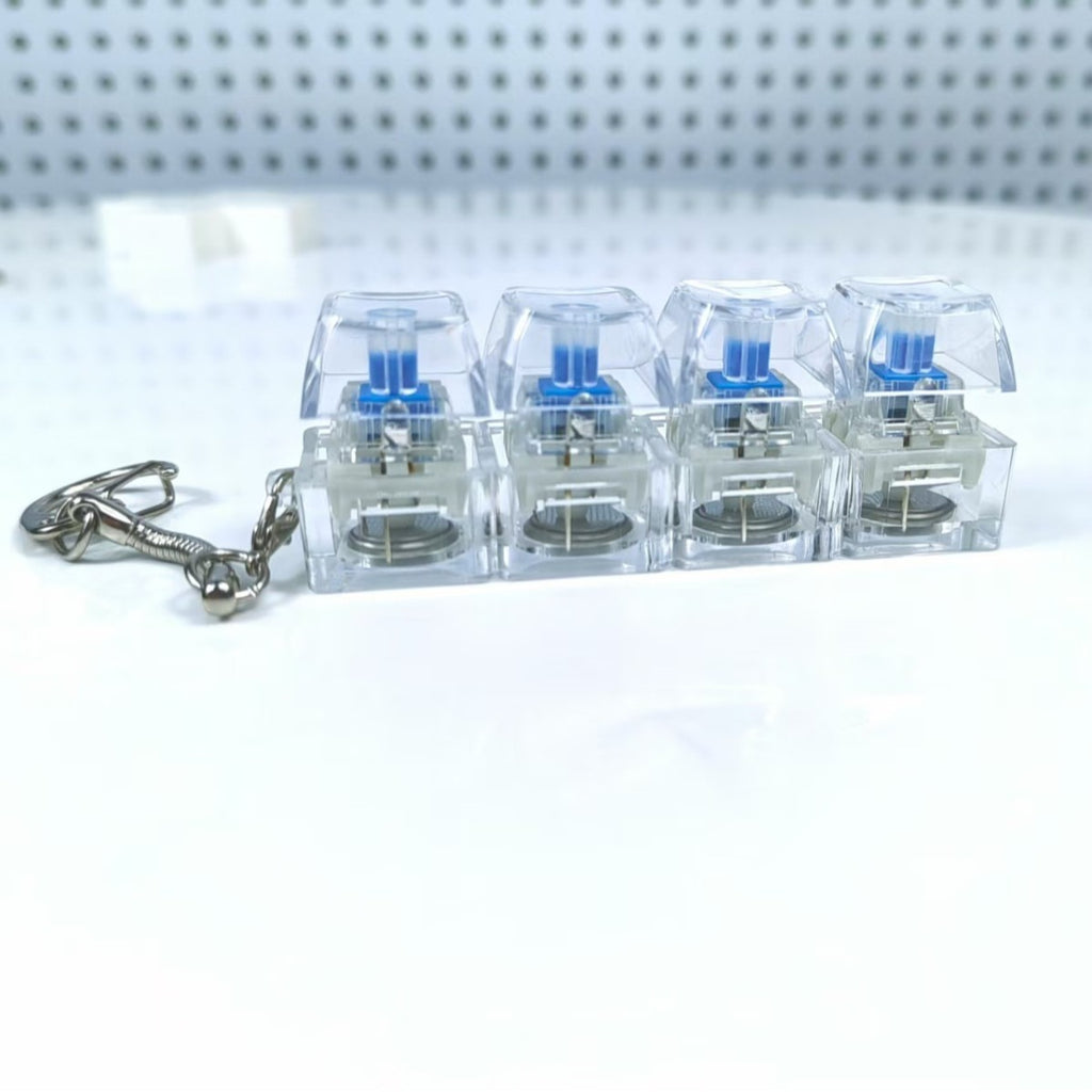 Chaveiro Teclado Mecânico 4 Teclas - Brinquedo Anti-Stress Luminoso com Botões Transparentes
