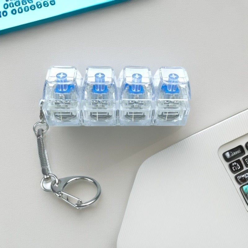 Chaveiro Teclado Mecânico 4 Teclas - Brinquedo Anti-Stress Luminoso com Botões Transparentes